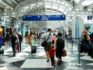 U.S. Government shutdown - Travelers queue at airports