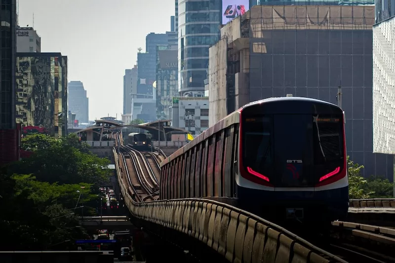 The BTS Skytrain snakes above Bangkok’s skyline, carrying thousands across the city each day.
