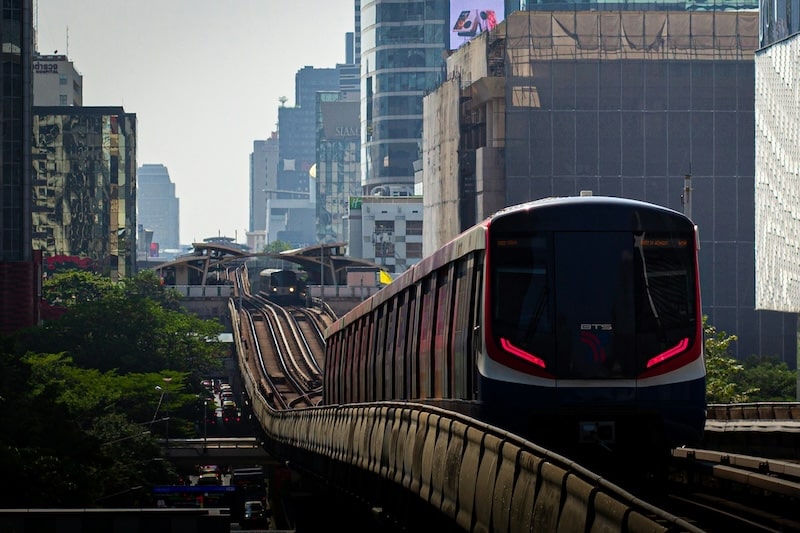 The BTS Skytrain snakes above Bangkok’s skyline, carrying thousands across the city each day.