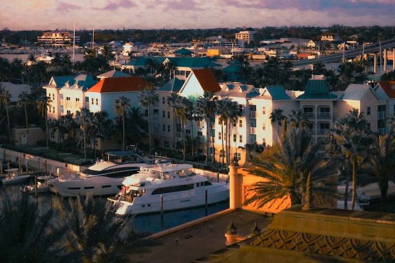 Living here isn’t just about a roof and walls but the privilege of stepping into sunshine with the harbor as your backyard. But behind the pastel facades is the real calculation: beauty that’s worth planning for, budgeting for, and choosing with clear eyes so the dream lasts longer than the vacation glow.