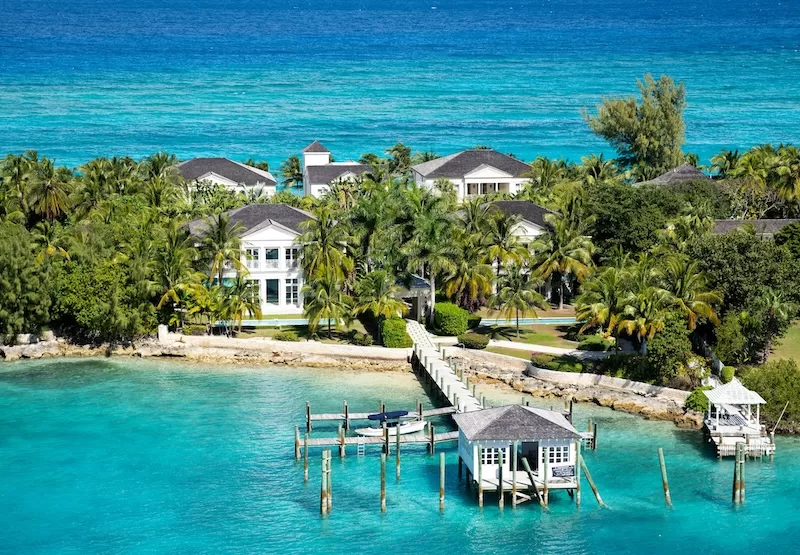 The paperwork may list you as a homeowner, but the real proof is right here: sunlight glinting off the turquoise shallows and a key that opens a door you never have to check out of.