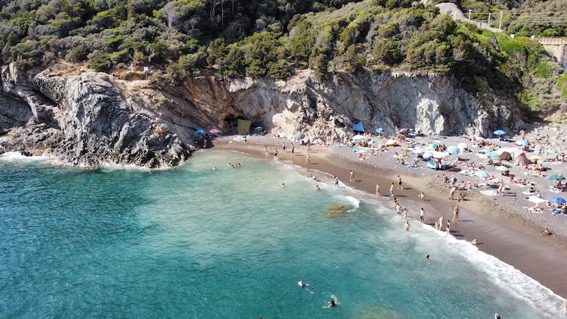 Afternoons in Livorno slip between sun and salt. Swimmers, fishermen, and families sharing the same rocky coves beneath the old coastal road.