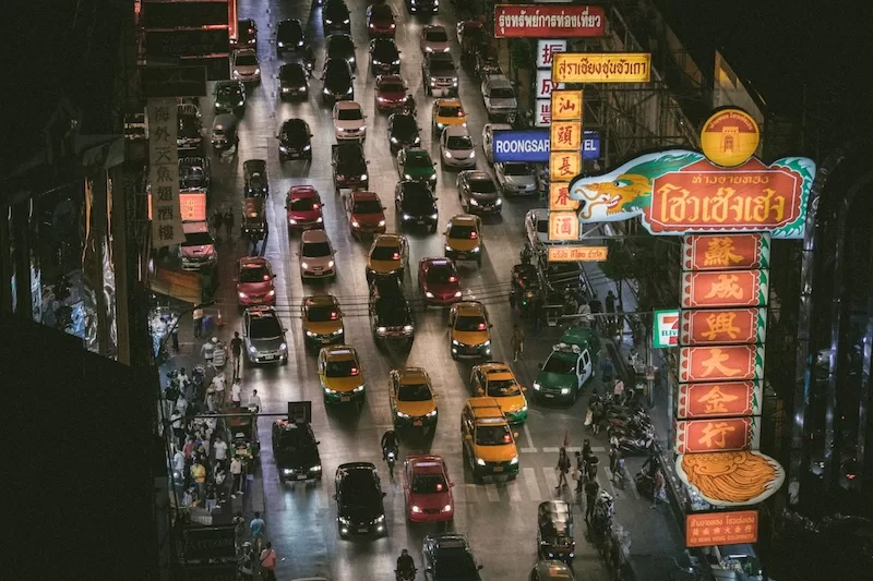 Even at night, Bangkok’s streets pulse with movement. Traffic lights flicker, neon signs glow, and taxis edge forward one car length at a time. The gridlock is frustrating, yes, but it’s also part of the city’s heartbeat, a slow-moving portrait of patience and persistence.