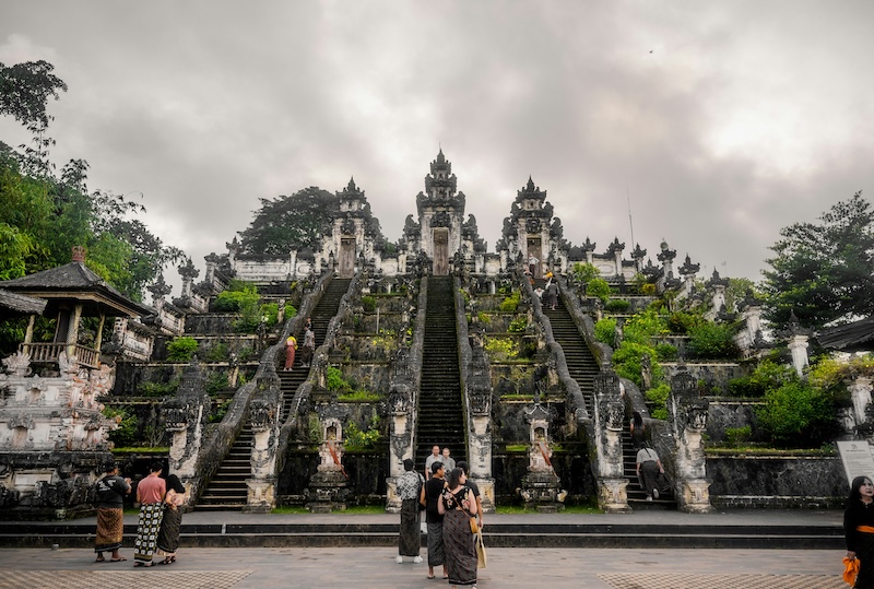 Temples like this become familiar landmarks in daily life. You learn the right way to step, to speak, to pause. Small gestures of respect help you feel part of the village heartbeat.