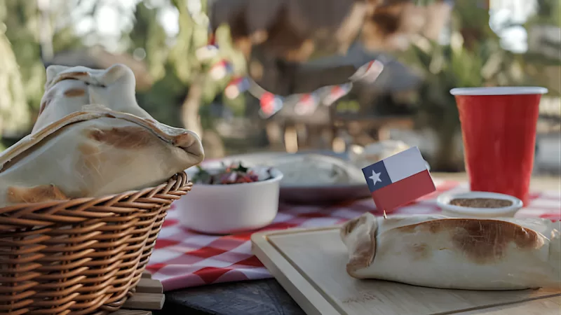 Warm pastries, music nearby, and the smell of grilled meat in the air. Fiestas Patrias tastes like this.