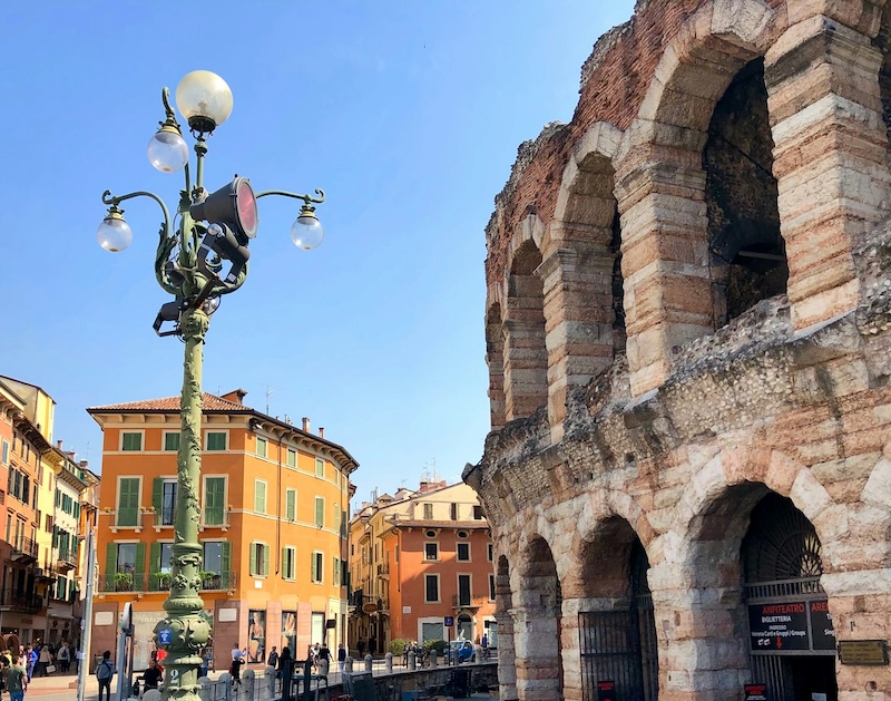 In Verona, like in most of Italy, time feels layered. You buy a ticket to an ancient arena, grab coffee next door, and realize the past never really left.