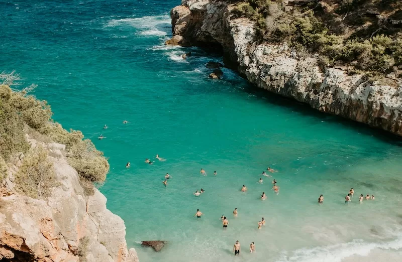 By summer, Mallorca glows from dawn to midnight. The water clear and irresistible, the air heavy with salt and laughter, and the days long enough to forget what time it is.