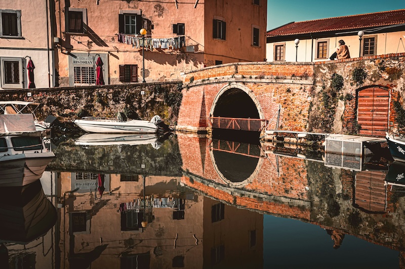 Livorno’s canals catch the afternoon light, part working port, part seaside calm, and always unmistakably Tuscan.