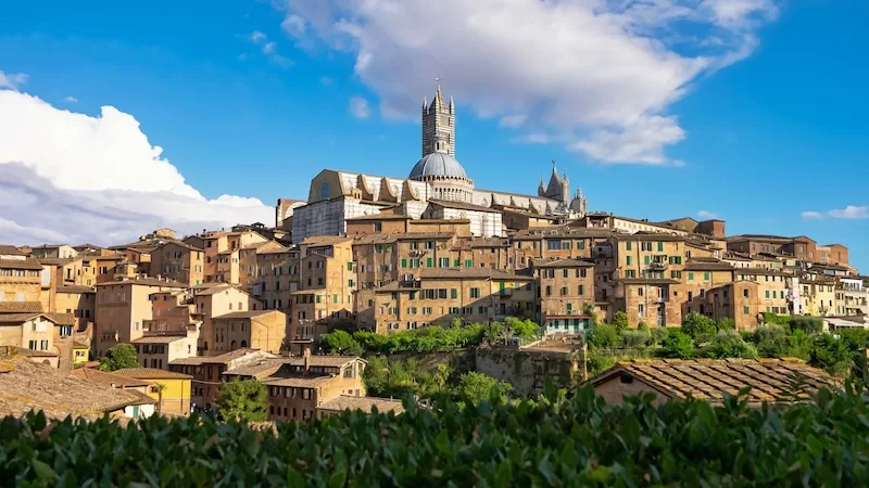 Siena blends medieval calm with modernity, a city where Wi-Fi signals bounce between centuries-old walls.