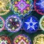 Colorful illuminated Christmas decorations and lanterns displayed in Manila Philippines showing extended Christmas season celebration and festive traditions