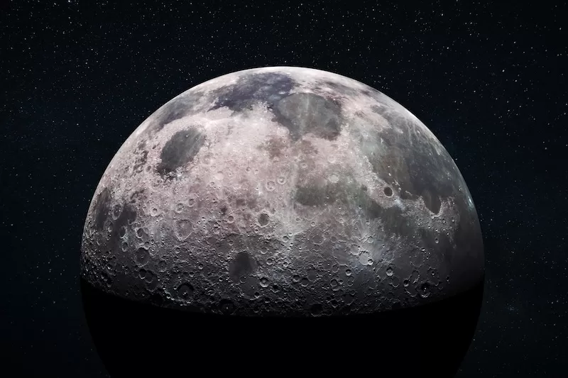 Detailed view of Moon's surface with craters and terrain showing NASA space exploration mission and Trump administration's accelerated lunar landing timeline goal