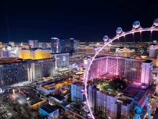 Aerial view of the Las Vegas Strip at night, the setting for the Plan B Summit, a global event on second residency, international investing, and asset protection.