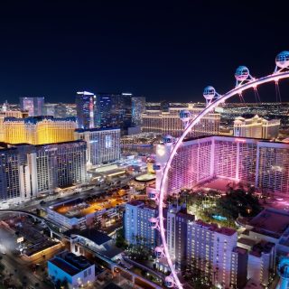 Aerial view of the Las Vegas Strip at night, the setting for the Plan B Summit, a global event on second residency, international investing, and asset protection.