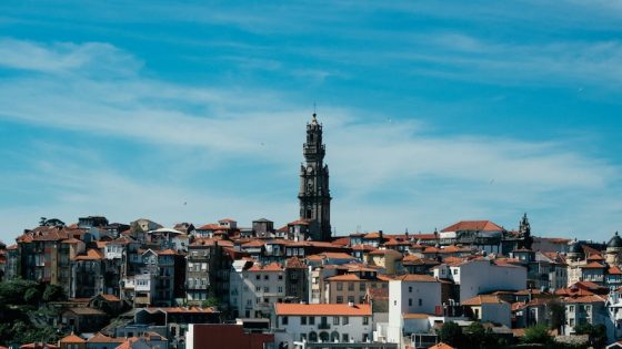 Porto Portugal cityscape with colorful buildings cascading toward Douro River showing why it's becoming Europe's top expat destination for living and remote work