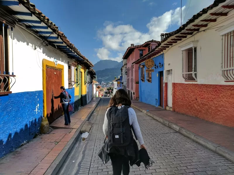 Colorful colonial street in mountain town showing Latin American digital nomad destinations like Mexico offering affordable long-term residency without citizenship barriers
