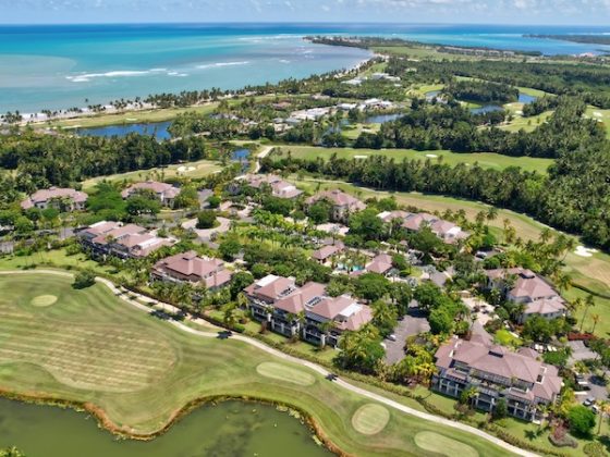 Luxury coastal real estate and golf resort development in an international destination, illustrating global property investment diversification