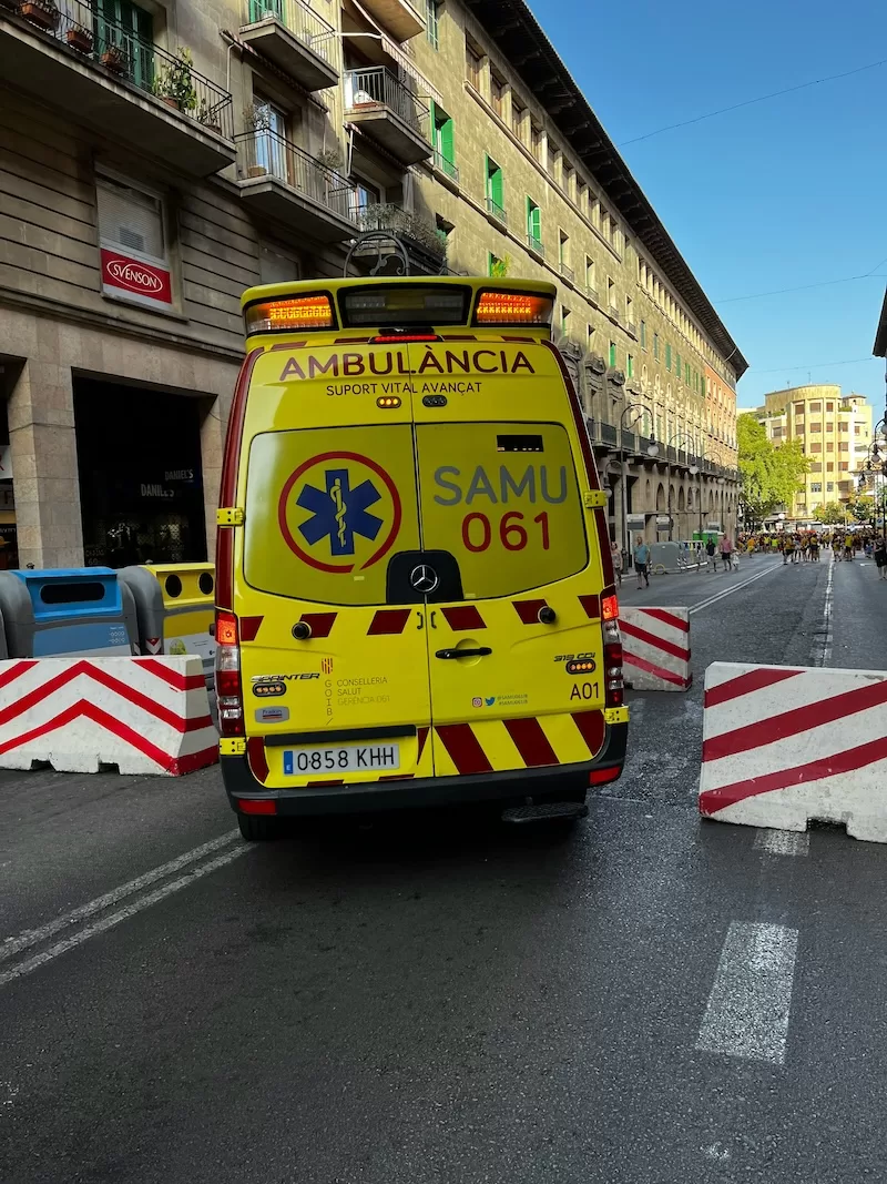 Emergency ambulance vehicle in urban setting showing emergency care access abroad