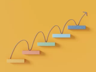 Upward arrow moving across rising steps representing growth and progress.