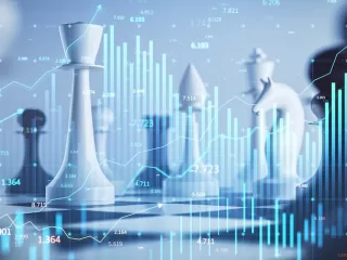 Chess pieces on a board overlaid with financial charts and data visualizations representing strategic financial planning