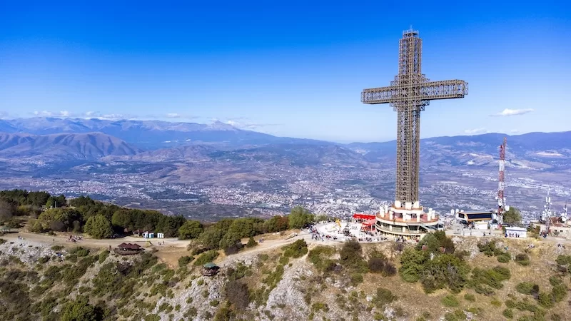 The Millennium Cross above Skopje overlooking the valley and surrounding mountains of North Macedonia.