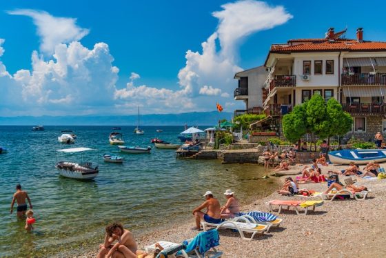 People enjoying the summer at the beach at Lake Ohrid in North Macedonia