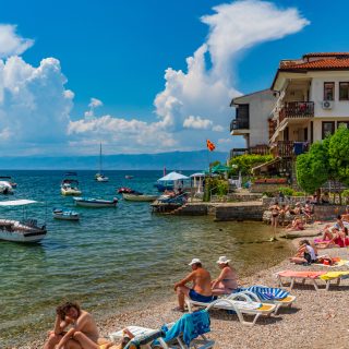People enjoying the summer at the beach at Lake Ohrid in North Macedonia