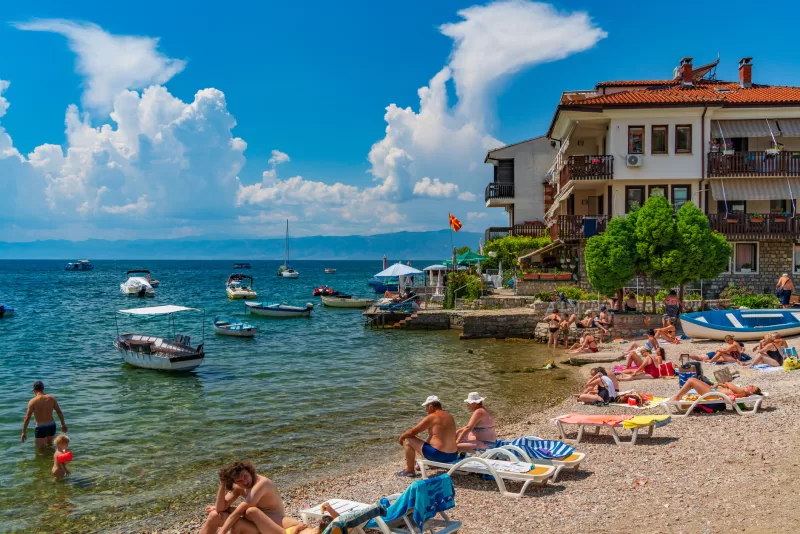 People enjoying the summer at the beach at Lake Ohrid in North Macedonia