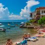 People enjoying the summer at the beach at Lake Ohrid in North Macedonia