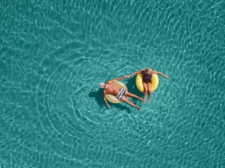 Senior couple enjoy sea water