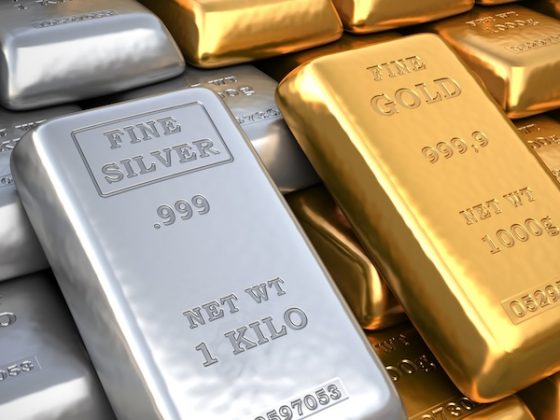 Silver and gold bullion bars displayed together as precious metals for inflation protection