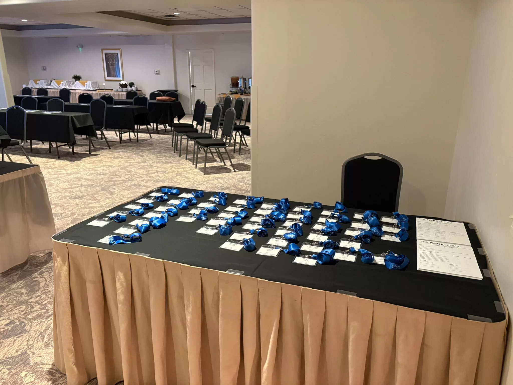 Registration table with name badges set out before attendees arrive at the inaugural Plan B Summit in Las Vegas