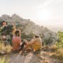 Couple overlooking a European village while slow traveling