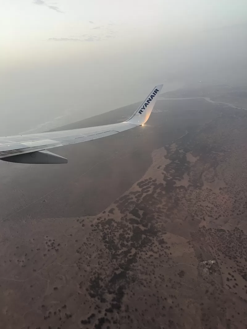 Ryanair airplane wing seen from above during a flight