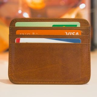 Wallet with multiple bank cards representing international banking diversification