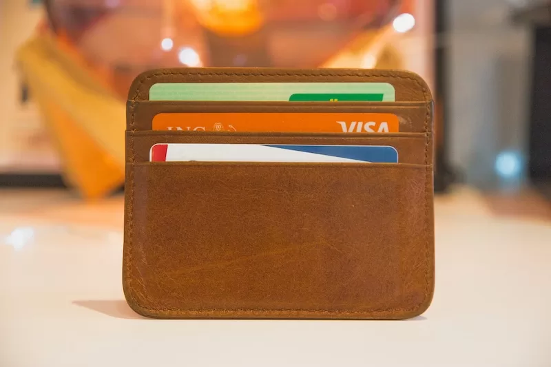 Wallet with multiple bank cards representing international banking diversification