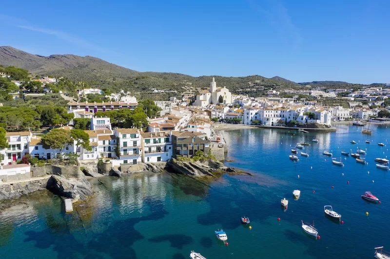 Aerial view of Cadaqués and its Mediterranean bay in Catalonia