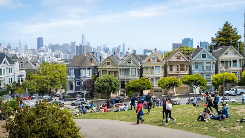 San Francisco homes and skyline representing US residency ties