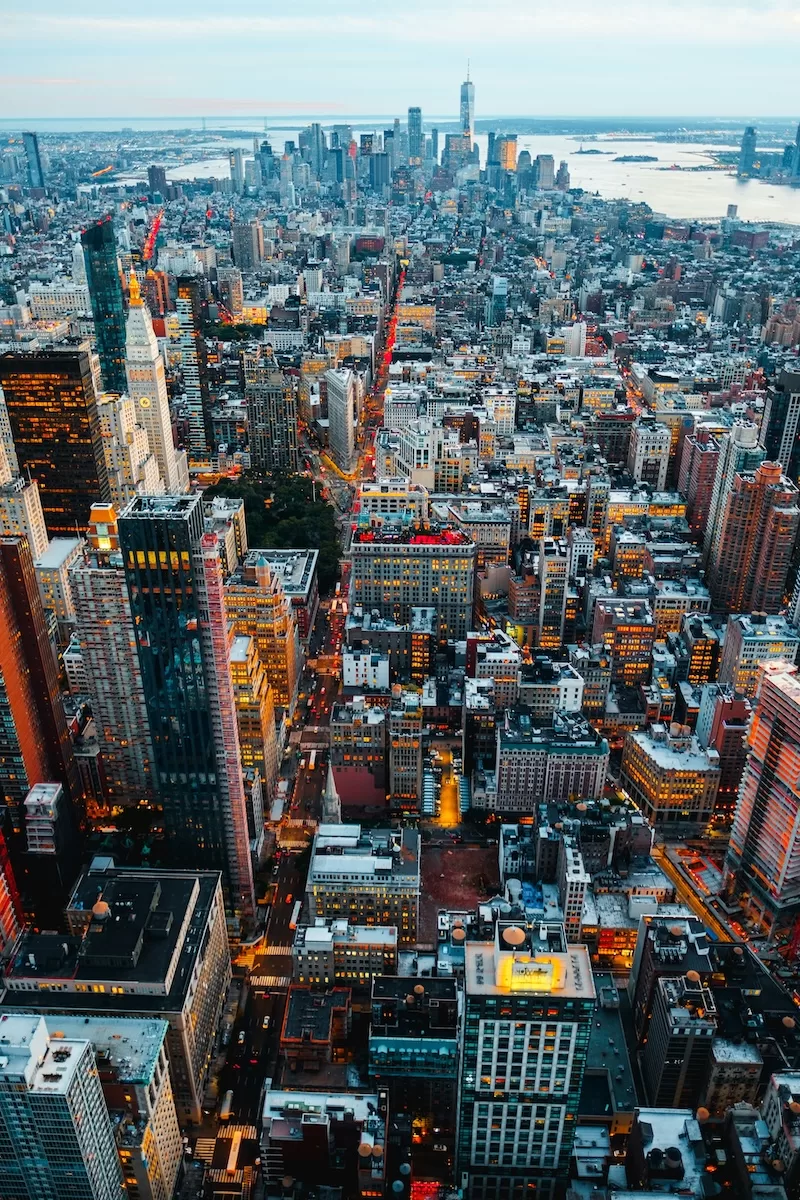 Aerial dusk view of the New York City skyline and Lower Manhattan