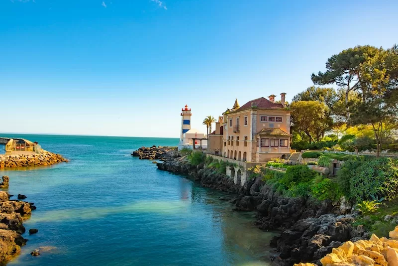 Portugal coastal imagery closing the article, reinforcing the "long game" framing used for Portugal's D7 pathway