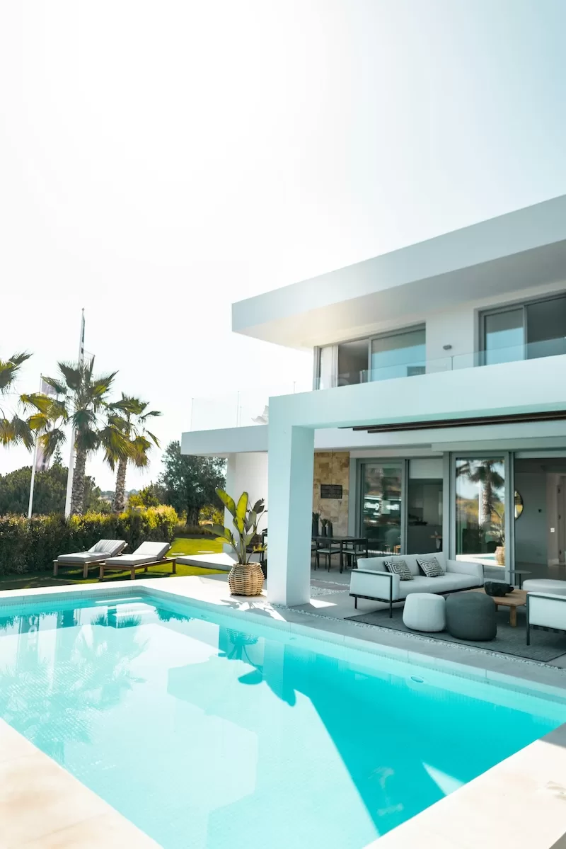 Modern luxury home with private swimming pool and outdoor living area
