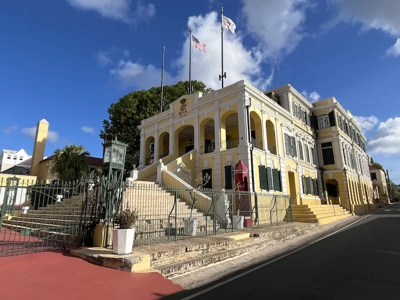 Danish colonial-era building flying the U.S. and Virgin Islands flags in Christiansted, St. Croix