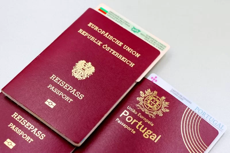 Passports and residence cards, representing what a digital nomad visa leaves you holding when it expires