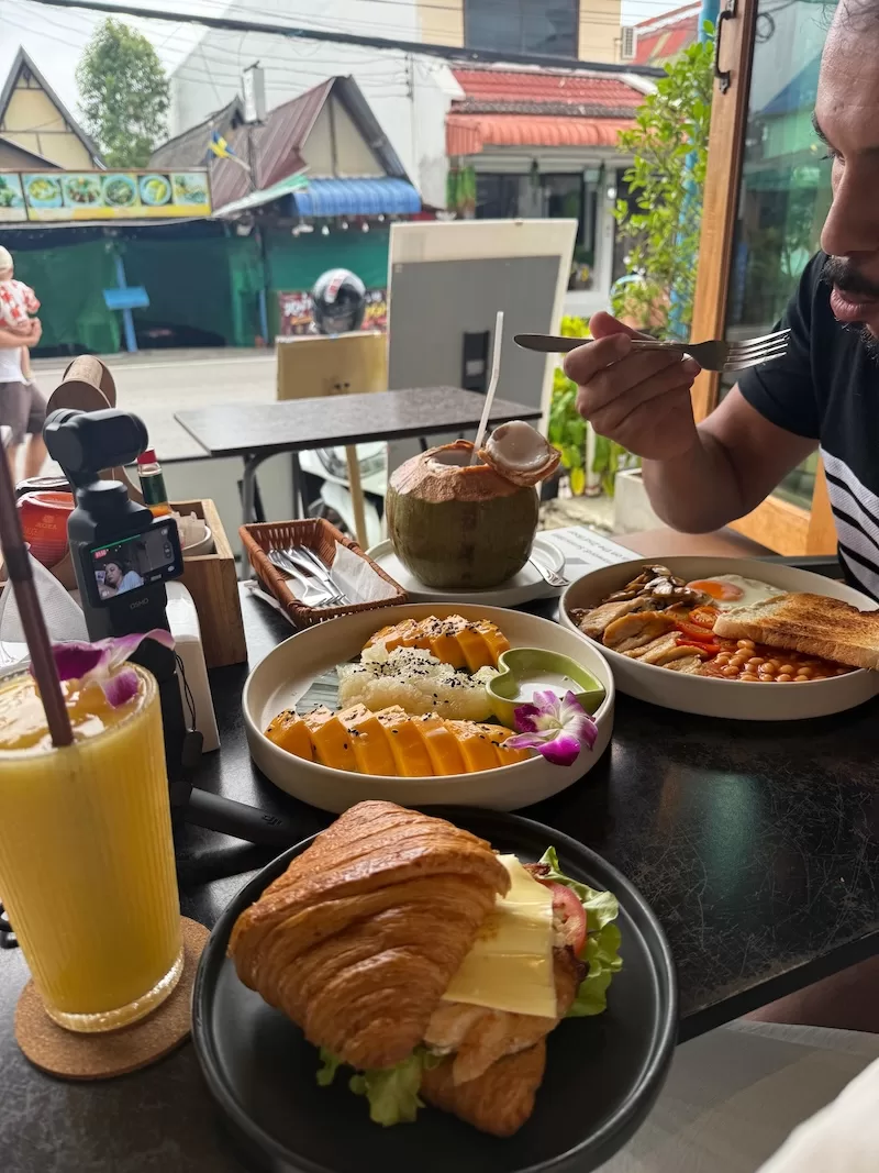 The 900-baht Phuket breakfast: English breakfast, stuffed croissant, mango sticky rice and fresh juices.