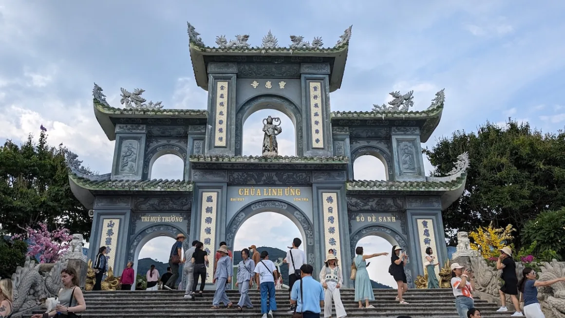 Visitors climb the steps to the gate of Linh Ung Pagoda on the Son Tra Peninsula.